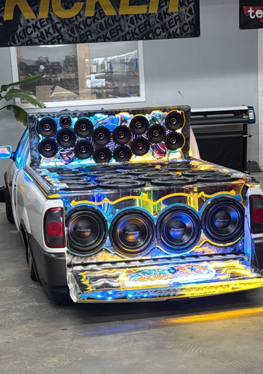 Pickup bed packed with mid-range speakers and subwoofers with LED accents